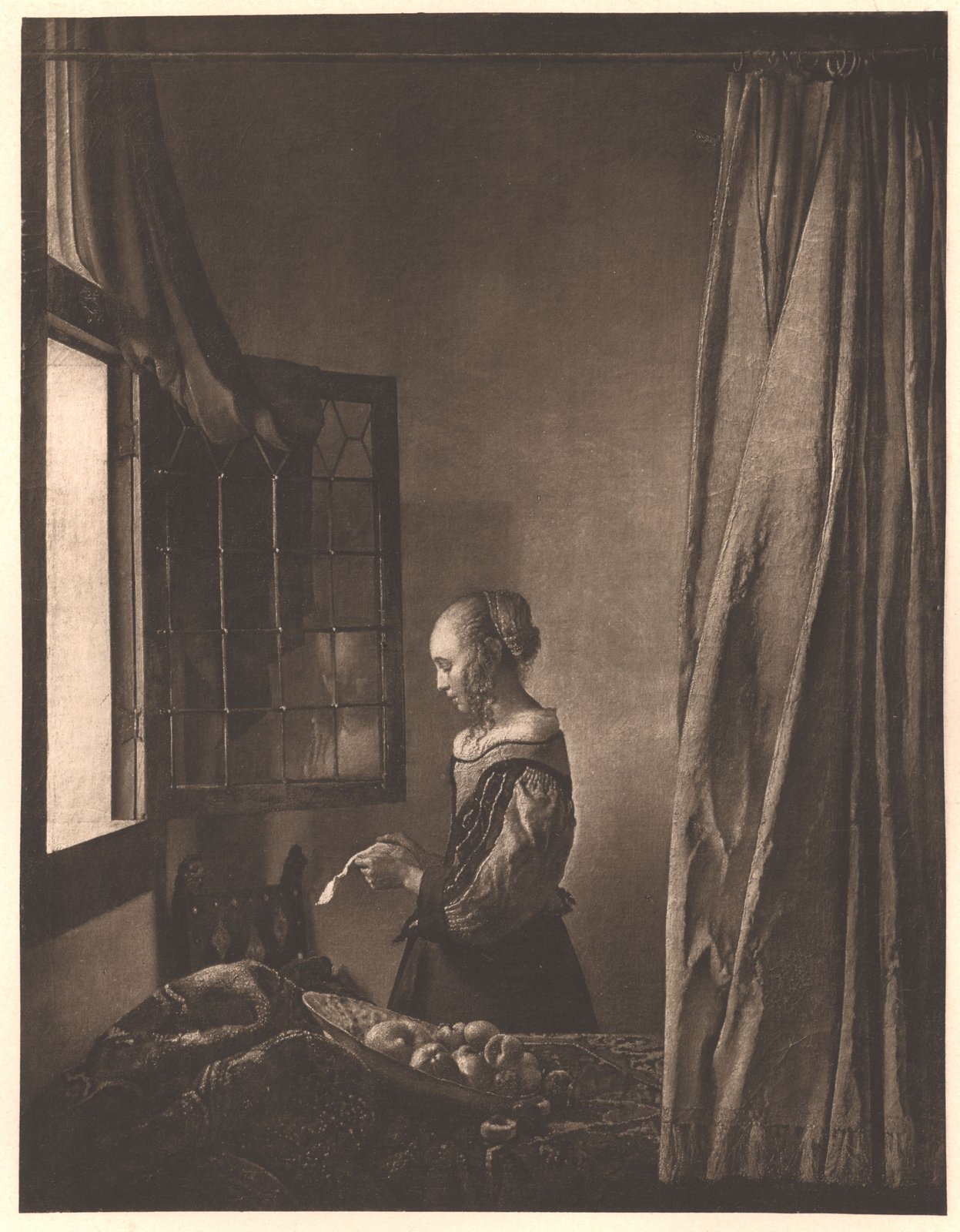 Donna che legge una lettera davanti alla finestra - Johannes Vermeer