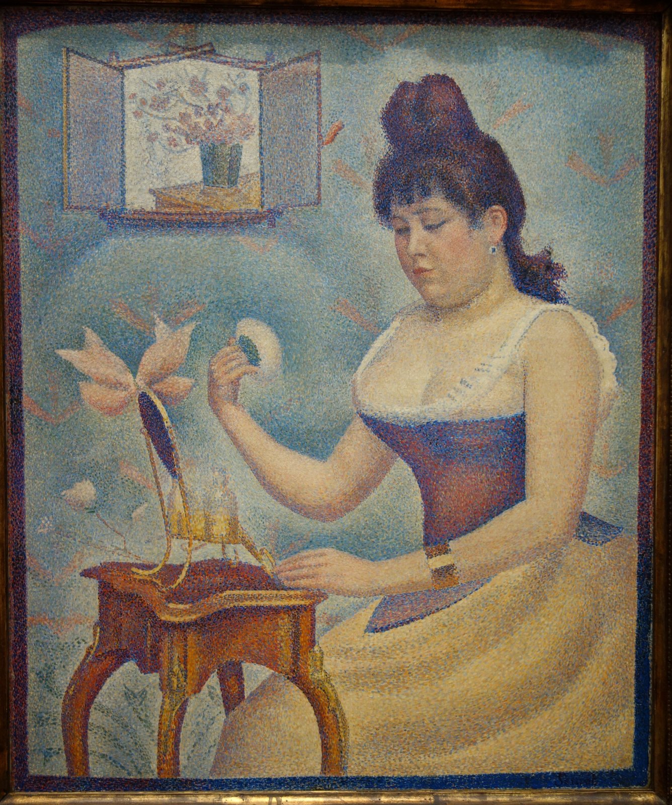 Giovane donna che si incipria - Georges Seurat